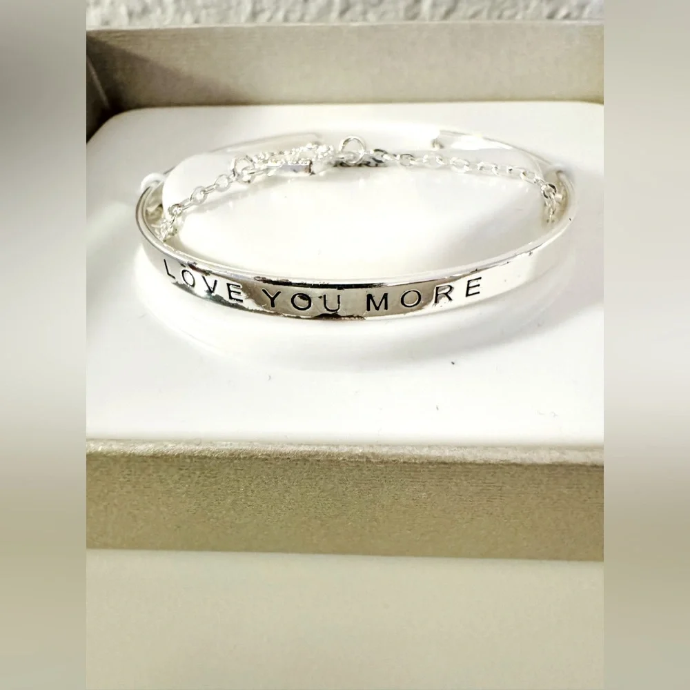NWT silver plated bracelet w/attached charm, coach charm, & leather purse charm - Picture 4 of 16